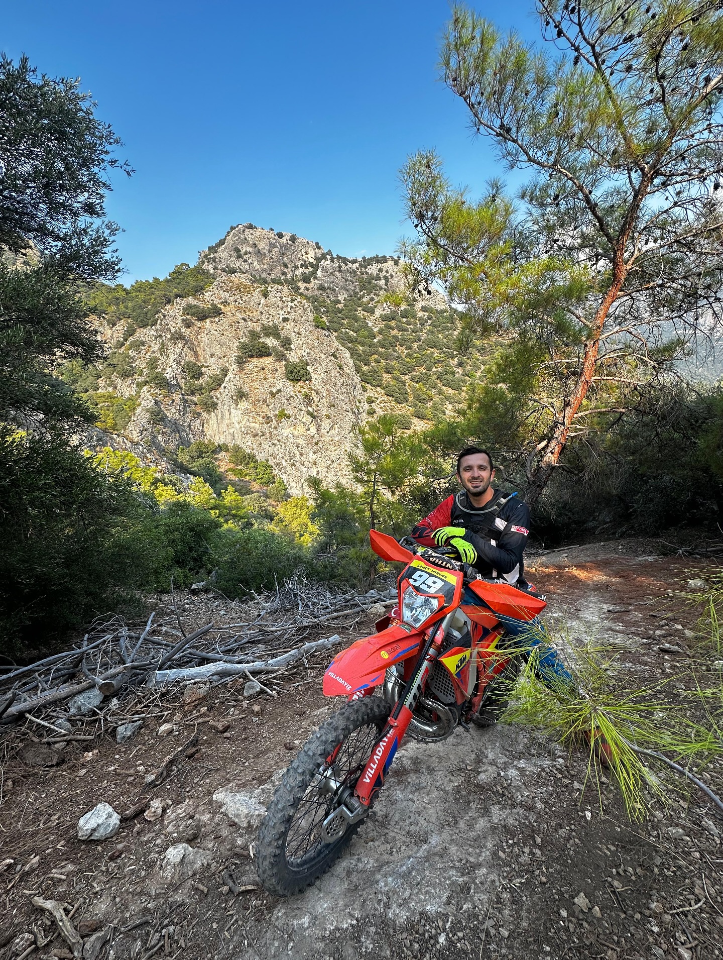 Ümit Kaya with an enduro motorcycle in the Lycian mountains